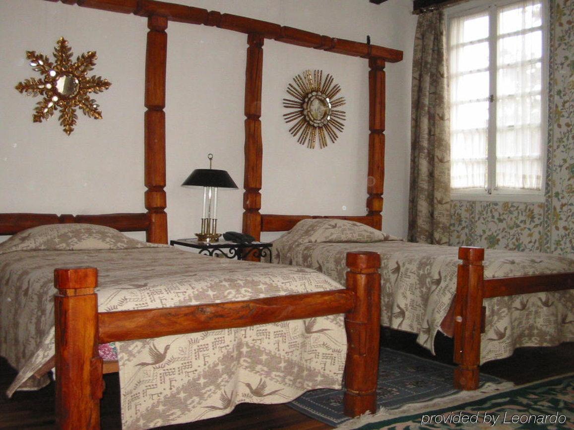 Hotel Los Alpes Quito Rom bilde